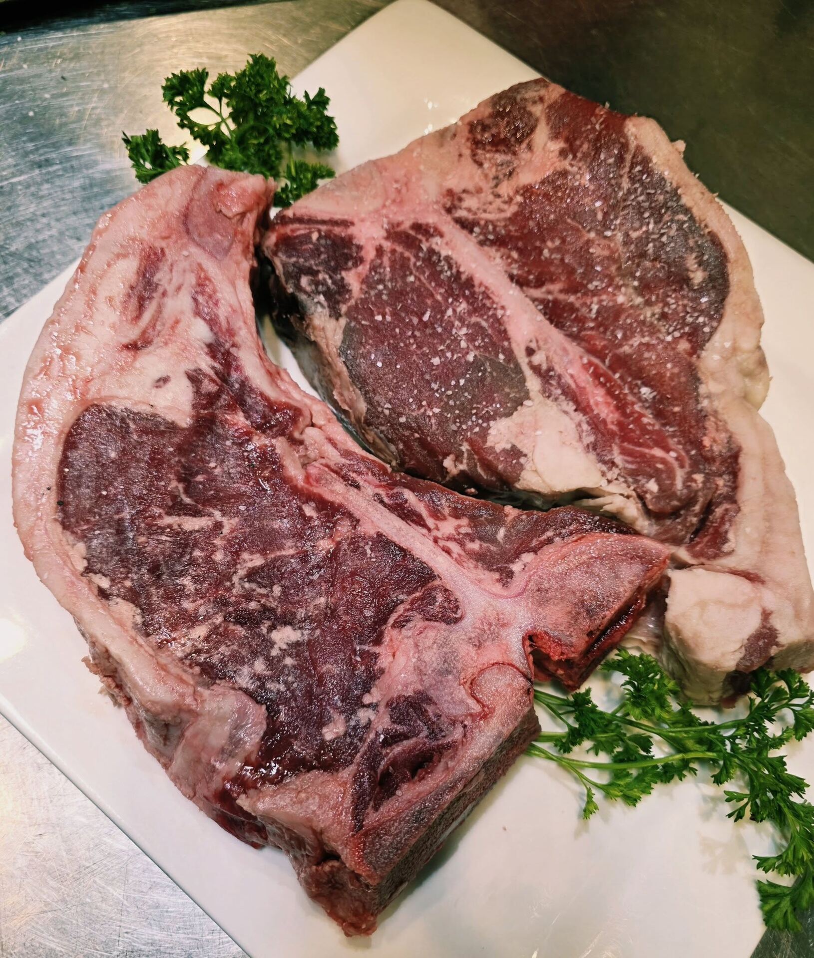Dry-aged, bone-in steaks from Borracho's family ranch