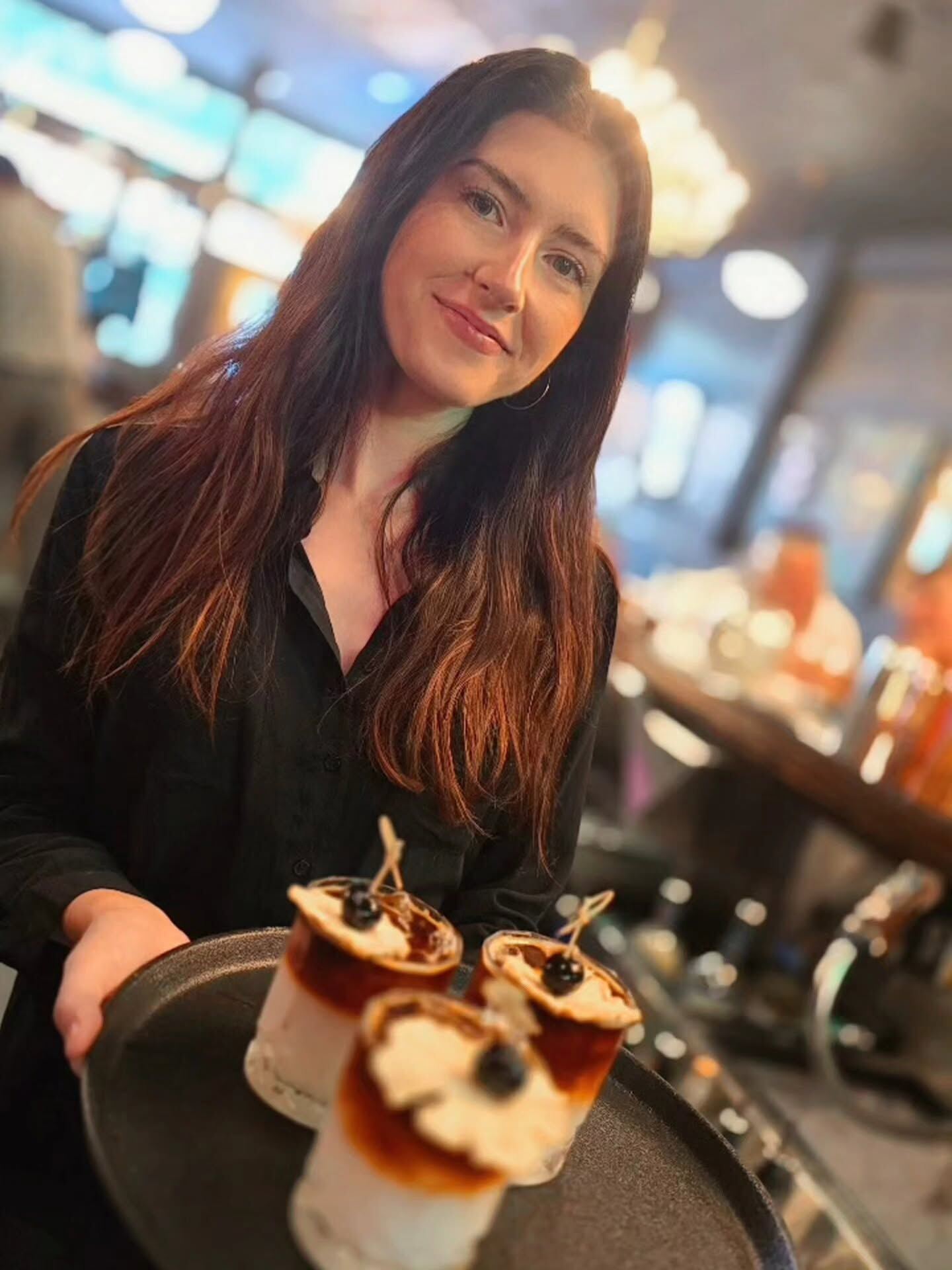 Tray of cocktails with cream topping at Borracho's